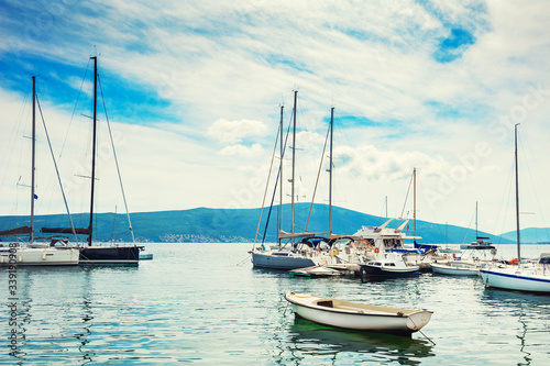 Yachts in the sea port of Tivat  Montenegro. Kotor bay  Adriatic sea. Famous travel destination.