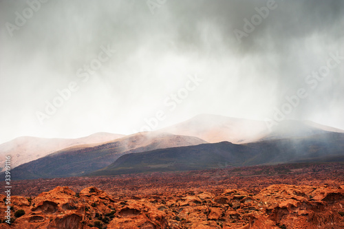 Mountains in the desert during the rain. Plateau Altiplano, Bolivia. South America landscapes