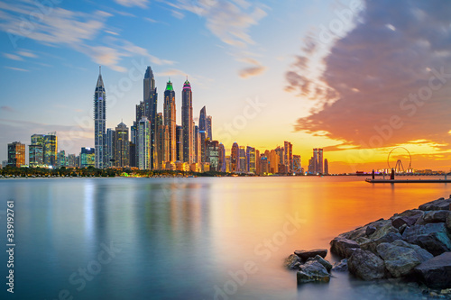 Photography Amazing and Luxury Dubai Marina - famous Jumeirah beach at sunrise, United Arab