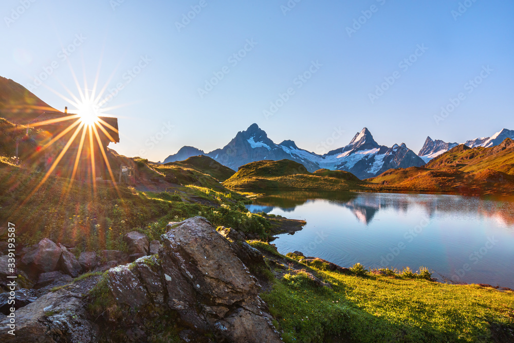 Bernese range above Bachalpsee lake. Peaks Eiger, Jungfrau, Faulhorn in famous location in Switzerland alps, Grindelwald valley
