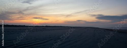 sunset in the evening on the beach © Dennis Twe