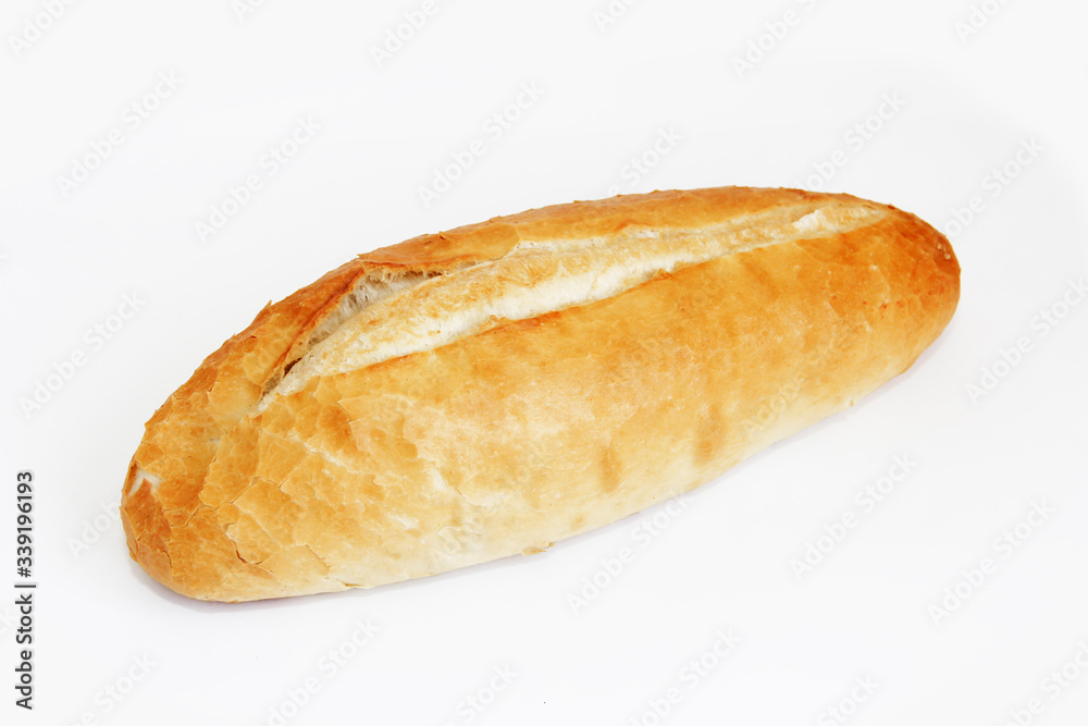 fresh loaf of yeast bread on a white background