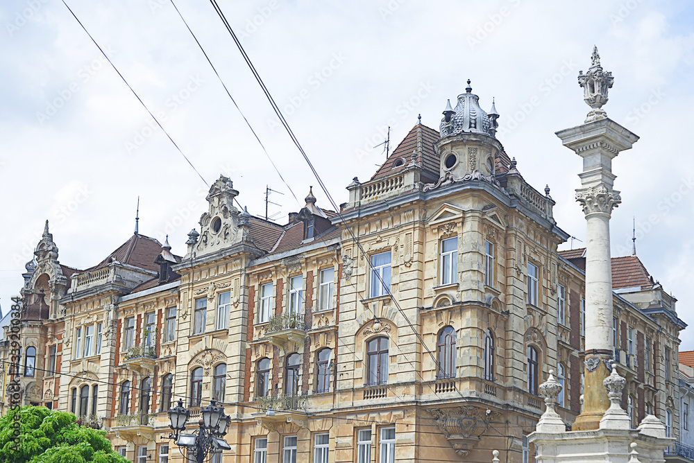 Historic beige stone building in lviv