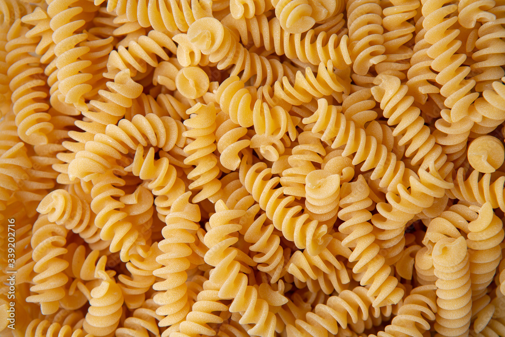 Fusilli pasta background macro view Fusilli pasta background macro view