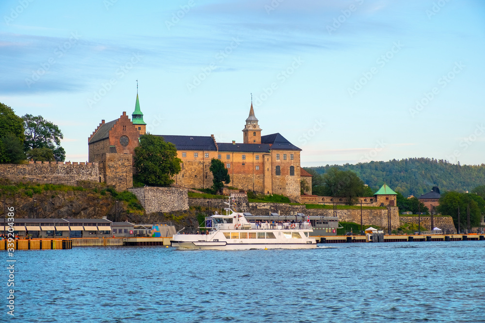 Oslo, Norway - Panoramic view of medieval Akershus Fortress - Akershus Festning - historic royal residence at Oslofjorden sea shore Oslo, Norway - Panoramic view of medieval Akershus Fortress - Akershus Festning - historic royal residence at Oslofjorden sea shore
