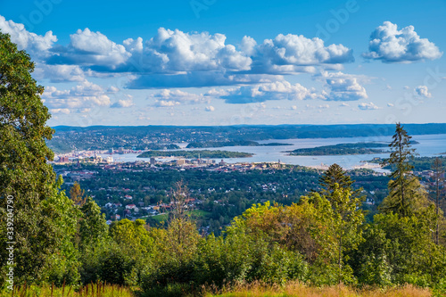 Oslo, Norway - Panoramic view of metropolitan Oslo and Oslofjorden sea bays and harbors seen from the Holmenkollen hill photo