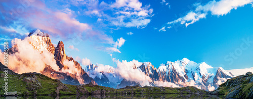 Magical sunset panorama of the Lac Blanc lake and Mont Blanc (Monte Bianco) on background, Chamonix location. Beautiful outdoor scene in Vallon de Berard Nature Reserve, France 