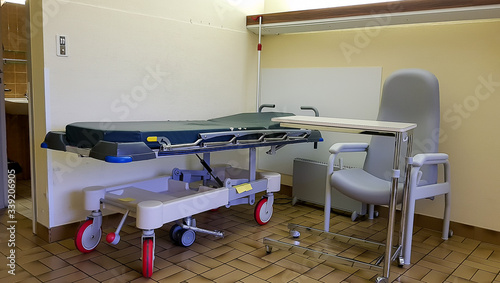 Empty stretcher trolley, special bed in hospital room
