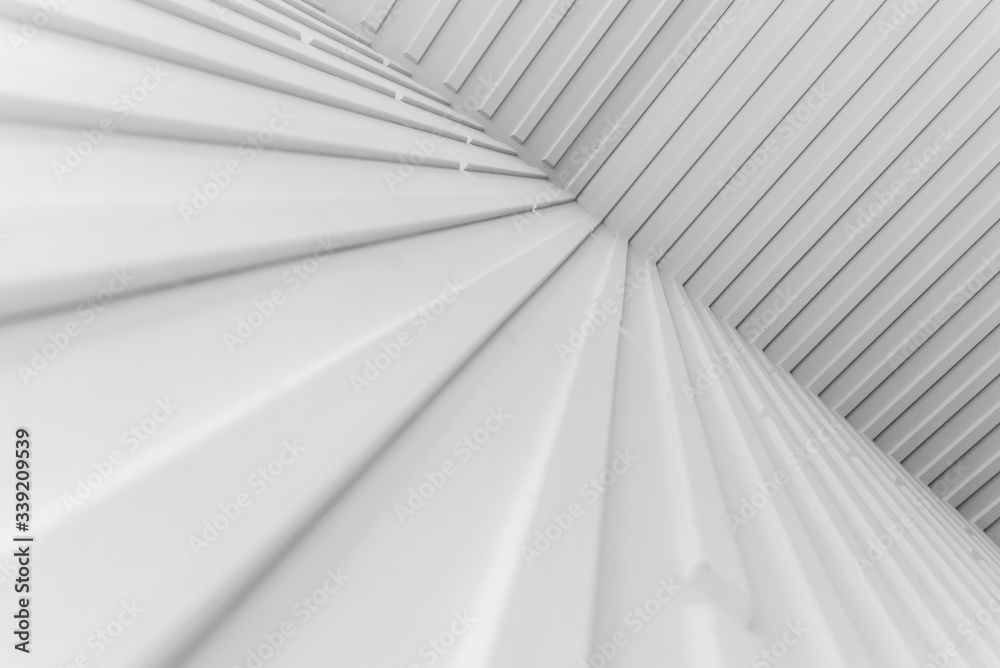 Obraz premium High resolution white abstract background for graphic design, application design.Volume diagonal lines.Soft convex wall panels, in light gray leather. High quality seamless realistic texture.
