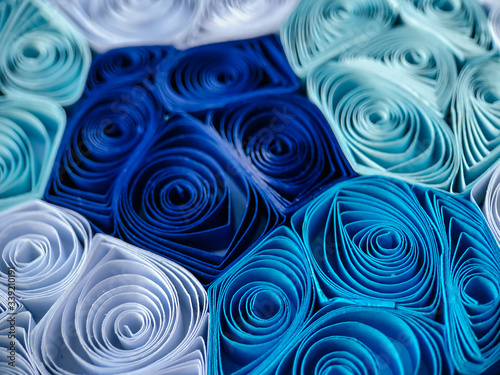 The texture of the product made by the technique of quilling. DIY crafts.