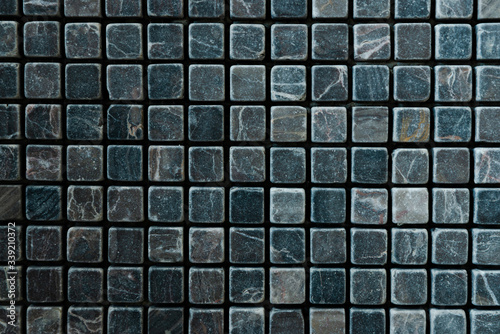 tile mosaic in the bathroom,vintage mosaic tiles texture background,gray and black mosaic wall texture and background