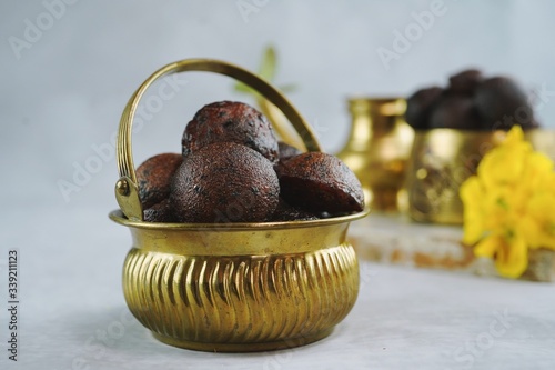 Neyyappam/ Unniyappam Or Vishu Appam- Kerala festival sweet with rice flour,selective focus photo