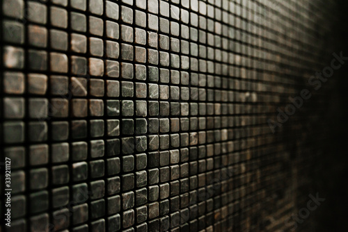 tile mosaic in the bathroom,vintage mosaic tiles texture background,gray and black mosaic wall texture and background