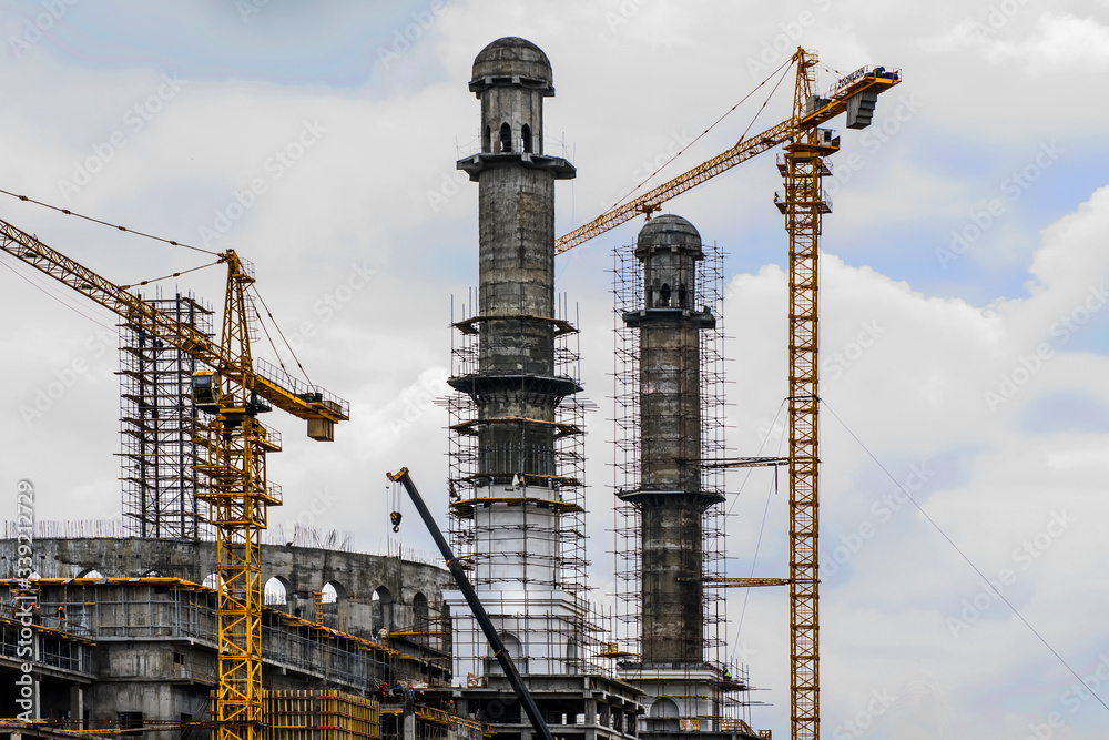 Shymkent, South Kazakhstan Region, Kazakhstan. April 11, 2020. The construction of the Great Muslim Mosque. Crane Concrete blocks. Metal carcass. Formwork. Big construction in the city Shymkent, South Kazakhstan Region, Kazakhstan. April 11, 2020. The construction of the Great Muslim Mosque. Crane Concrete blocks. Metal carcass. Formwork. Big construction in the city