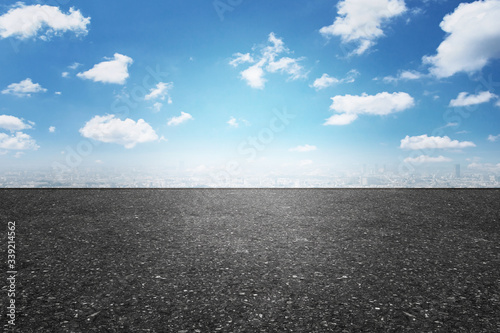 Asphalt road and sky cloud. An image of a milestone roadmap is a representation of success in the future goal © sichon