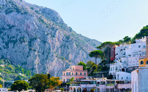 Fototapeta Naklejka Na Ścianę i Meble -  Cityscape with house architecture Capri Island at Naples Italy reflex