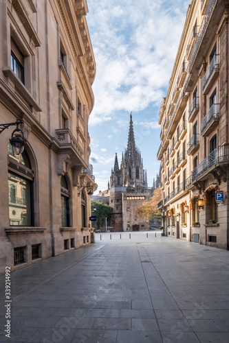 Barcelona, Catalonia / Spain: 04 09 2020: empty streets with the city's cathedral in the background in the city of Barcelona during the covid-19 coronavirus pandemic