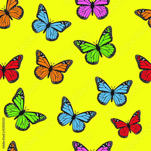 Seamless pattern of monarch butterflies in red blue orange and pink color © Anandhan