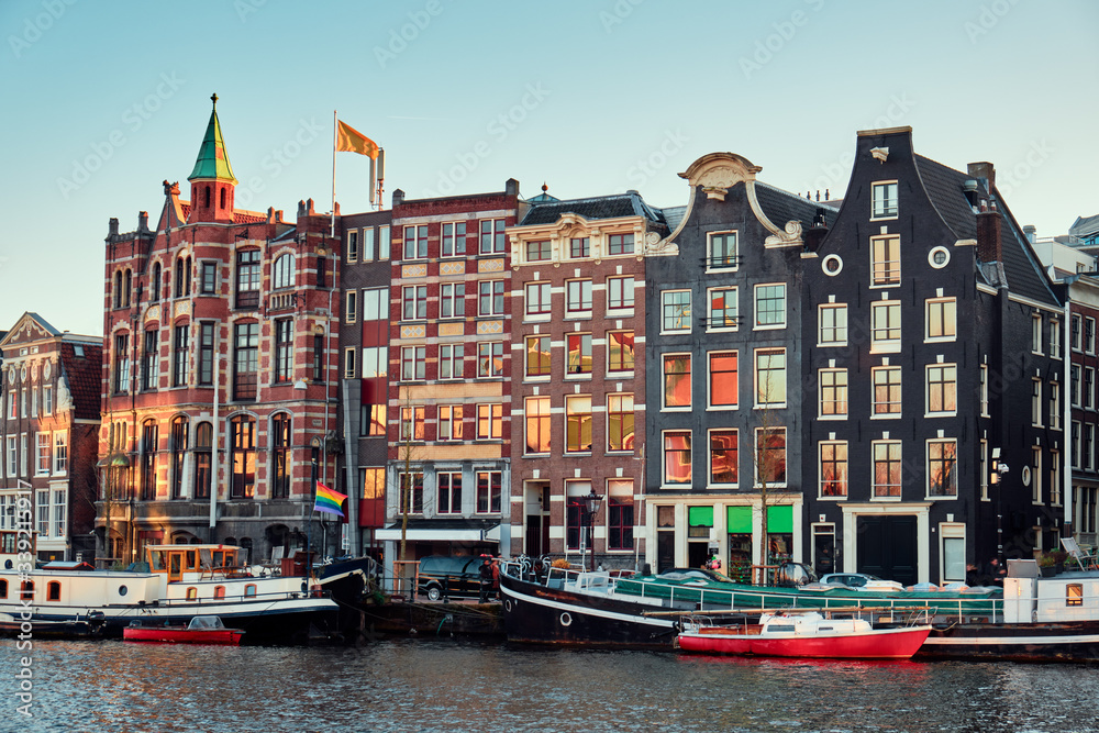 Houses over a canal in the Amsterdam. City landscape.