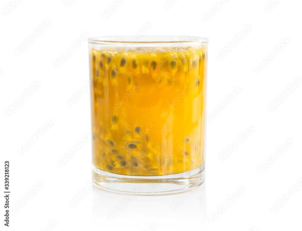 Fresh passion fruit juice in glass with green leaf isolated on white background, fruit healthy concept Fresh passion fruit juice in glass with green leaf isolated on white background, fruit healthy concept