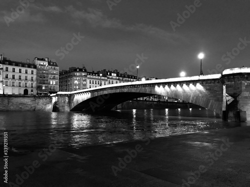 Black and white photography of Parisian bridge