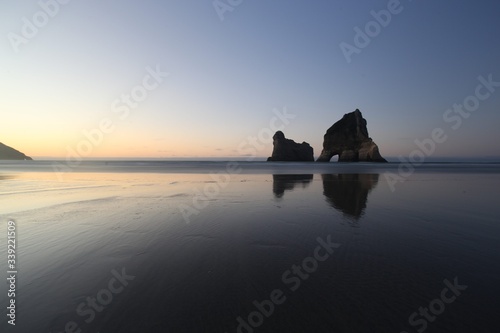 Elephant rock at Wharariki Beach, New Zealand. Sunset