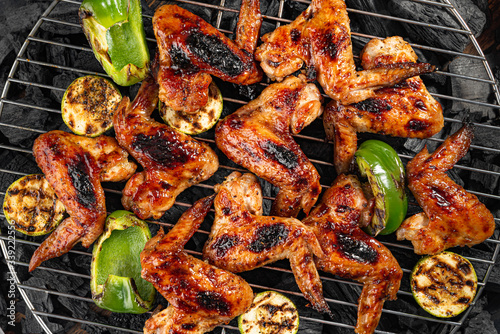 grilled chicken wings and vegetables