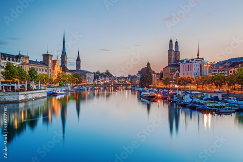 Scenic view of historic Zurich city center with famous Fraumunster and Grossmunster Churches and river Limmat at Lake Zurich  Zurich  Switzerland 