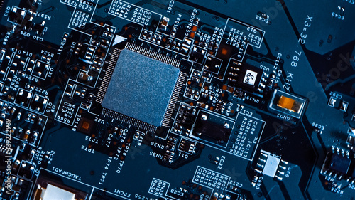 Macro Close-up Shot of Microchip, CPU Processor on Printed Circuit Board / Computer Motherboard with Components Inside of Electronic Device, Parts of Supercomputer.