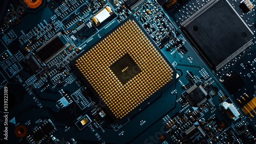 Fotografie Macro Close-up Shot of Computer Motherboard with CPU Processor Socket