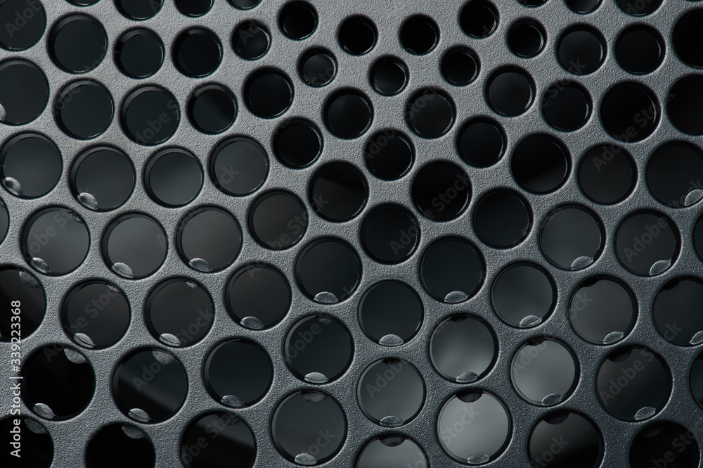 Perforated black matte surface Perforated black matte surface
