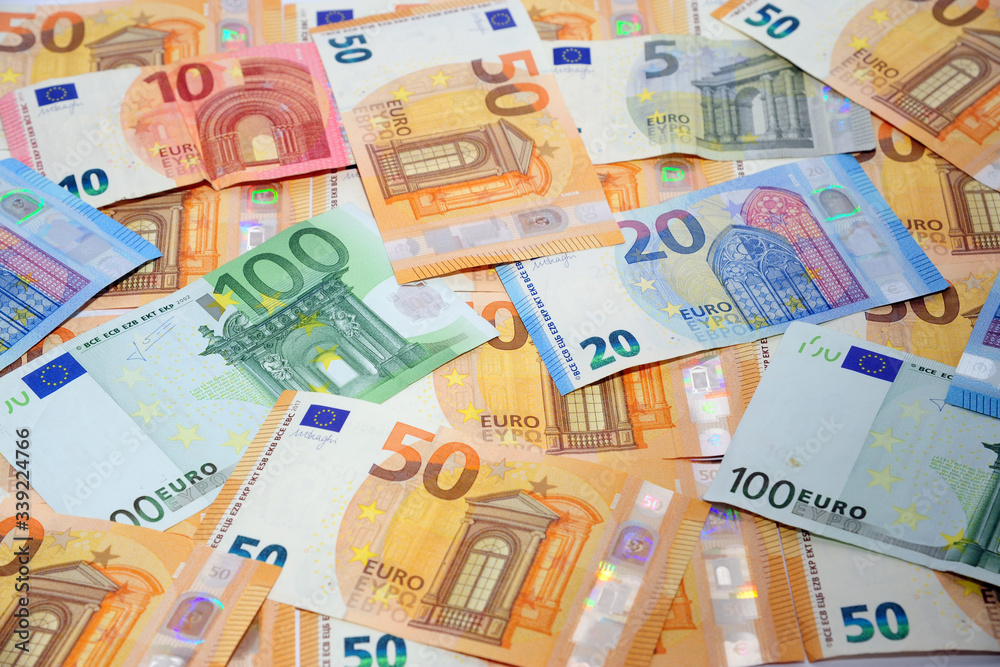 tangent policy, money - euro banknotes (100 €, 50,20,10,5 ) - inflation and increase in the cost of living - devaluation euros, spread and economic crisis - stock exchange and finance