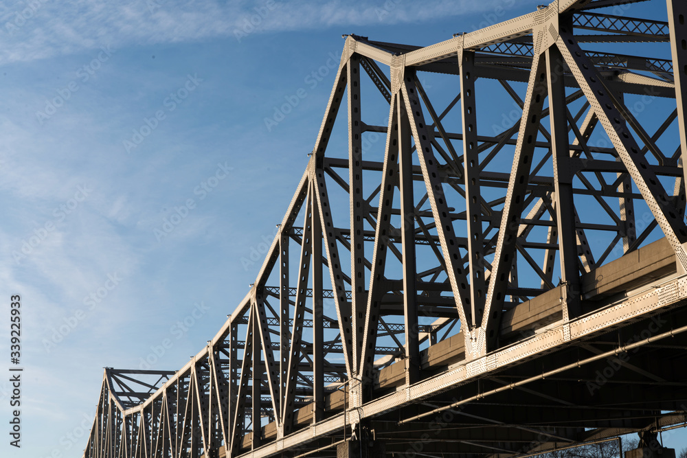 Close up of Metal Bridge Trestles of the Supply Chain and Blue Sky with Copy Space
