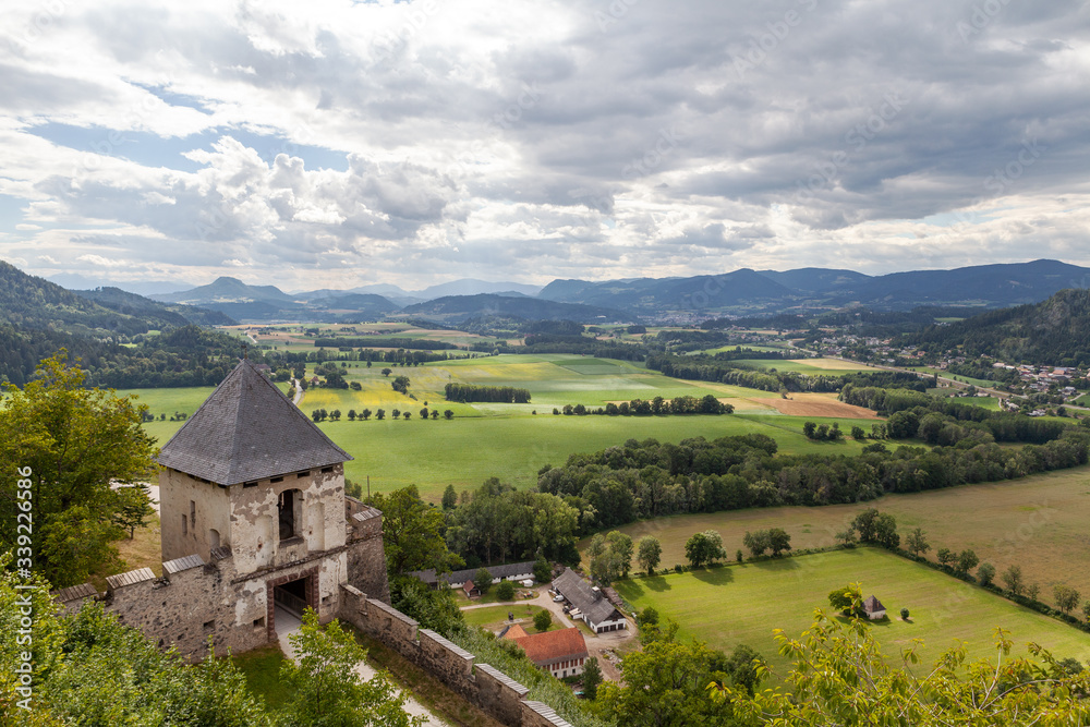 view of the Alpine mountains, walls, castle tower, Austria