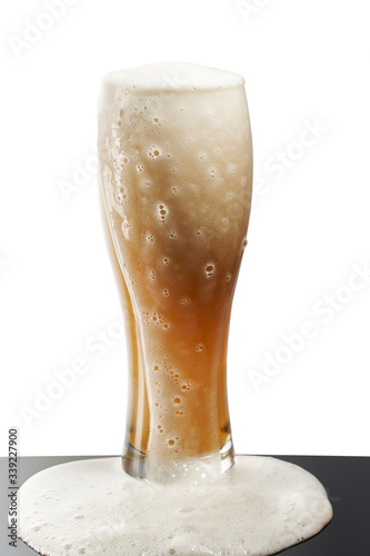 cold beer in glass with foam on white background (ID: 339227900)