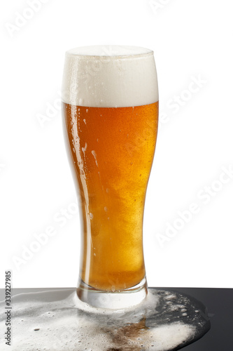 cold beer in glass with foam on white background (ID: 339227985)