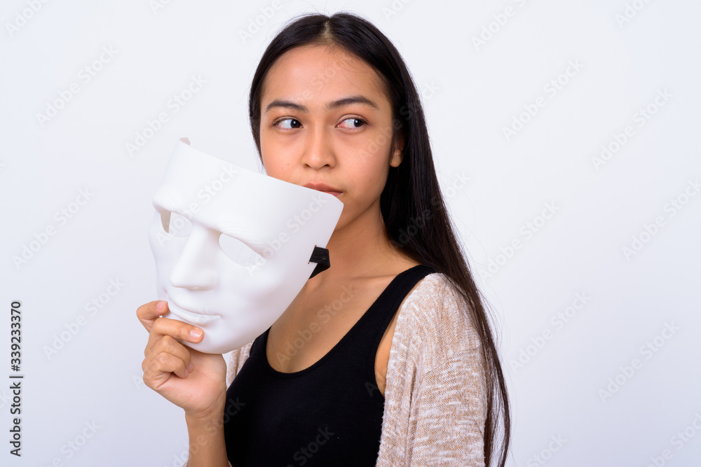 Portrait of young beautiful Asian woman with mask Portrait of young beautiful Asian woman with mask