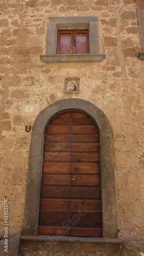 Bagno Regio, Italy, Old building and saint © Bruno