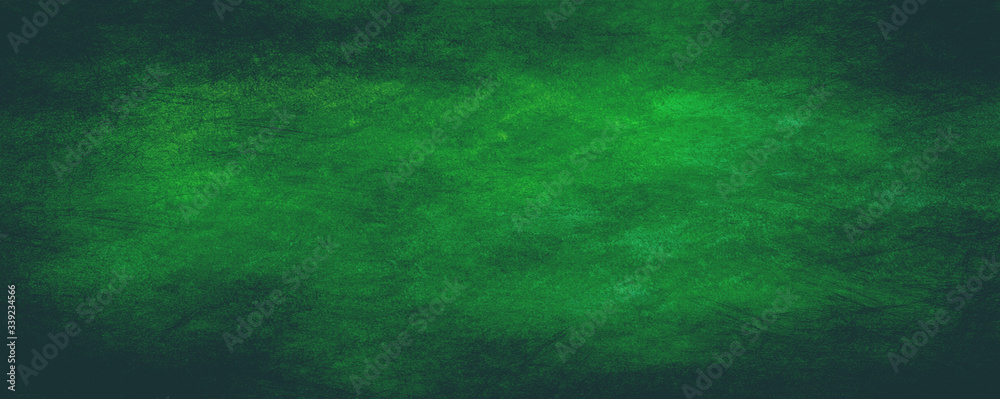 Green background with dark shadow border and old vintage grunge texture Green background with dark shadow border and old vintage grunge texture