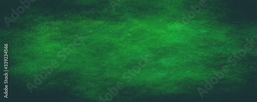 Green background with dark shadow border and old vintage grunge texture