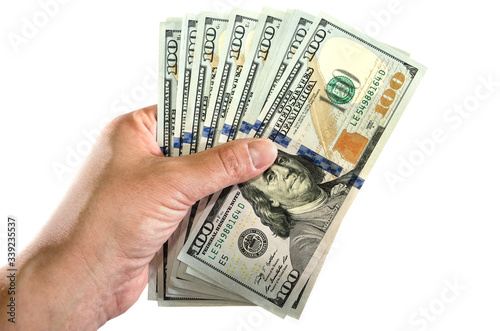 dollars in hand isolated on a white background.