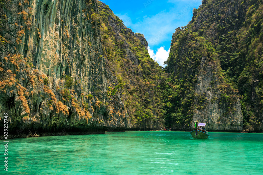 Beautiful mountain in the sea with boat at Krabi ,South of Thailand Beautiful mountain in the sea with boat at Krabi ,South of Thailand