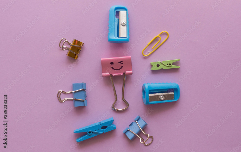 clips of sharpener on a lilac background