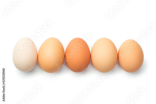 a lot of chicken eggs on a white background