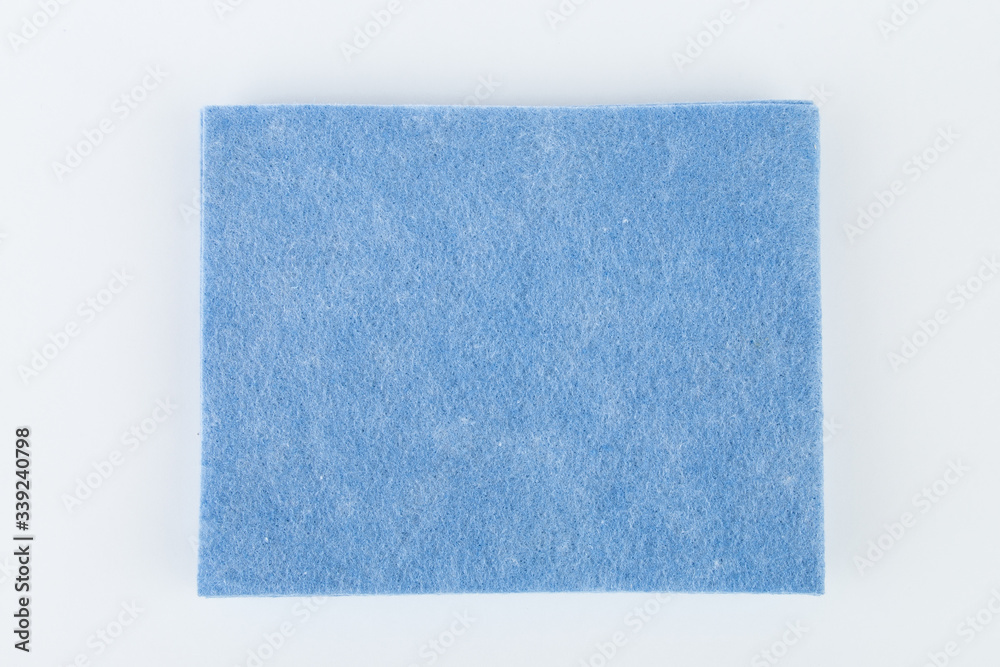 Fototapeta premium Kitchen rag for cleaning blue color on an isolated background.