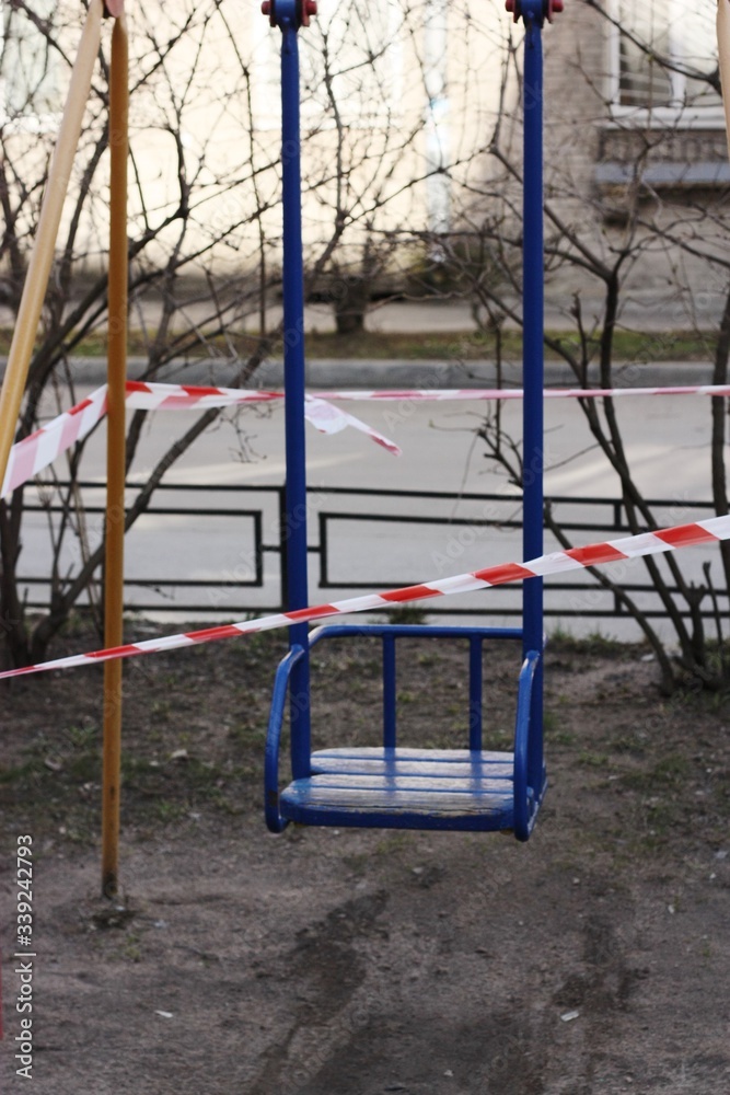 Children's swing is protected from coronavirus view Children's swing is protected from coronavirus view