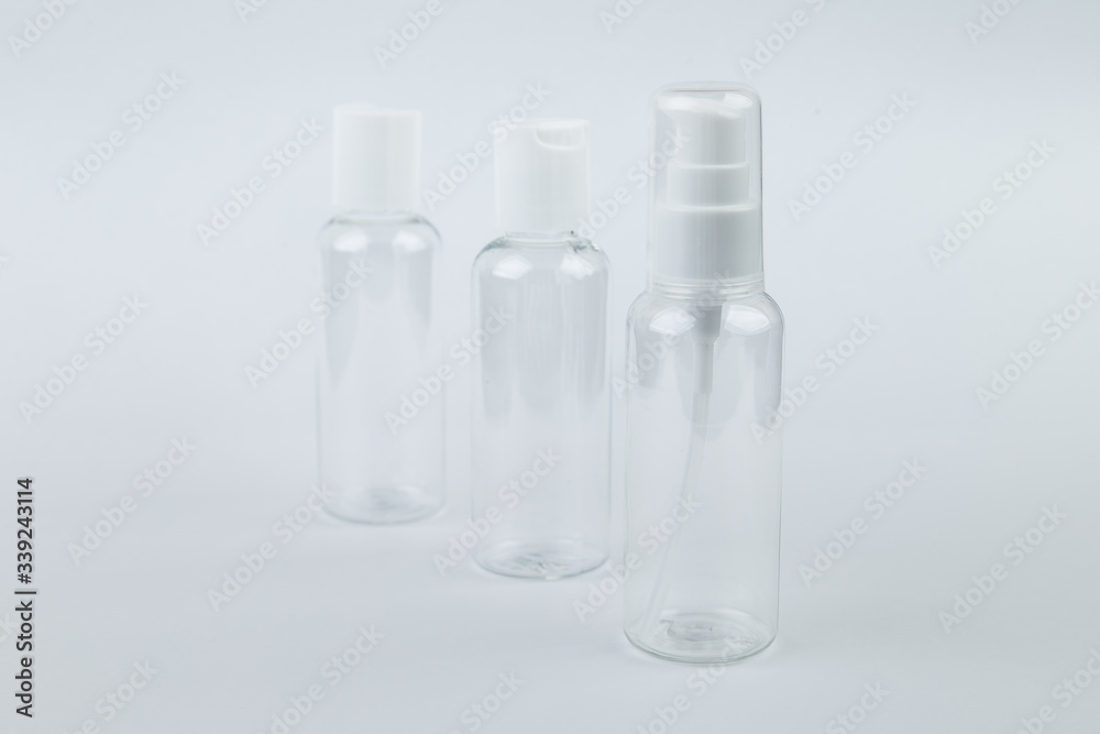 set of cosmetic bottles isolated on white background. Selective focus. set of cosmetic bottles isolated on white background. Selective focus.