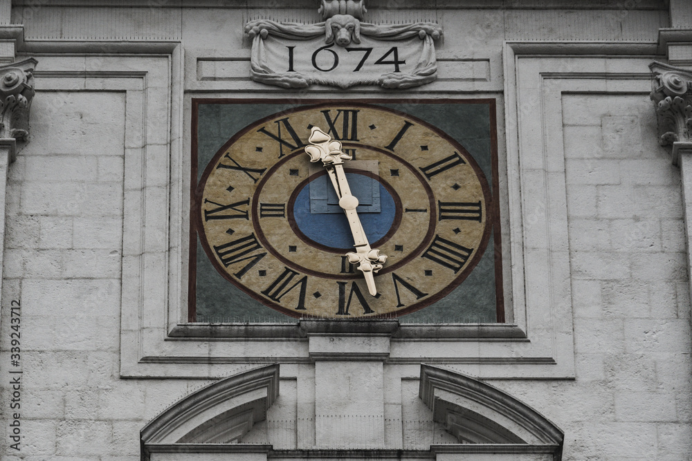 Clock tower with detailed view to the church clock at the dome of Saint Stephan Clock tower with detailed view to the church clock at the dome of Saint Stephan