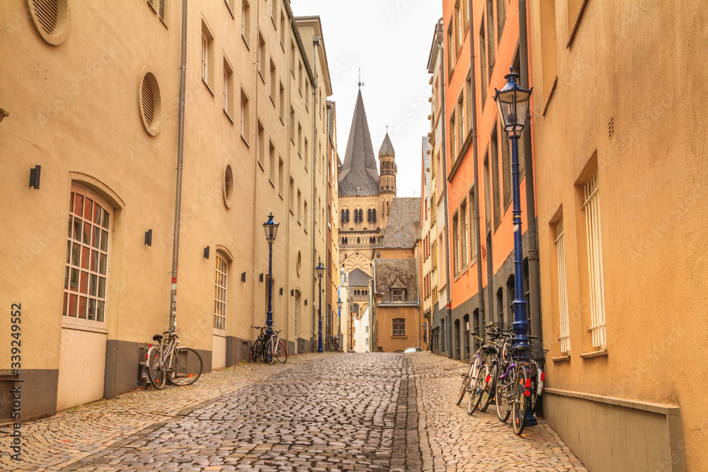 Cityscape - view of a medieval street near the Great Saint Martin Church in Cologne, North Rhine-Westphalia, Germany