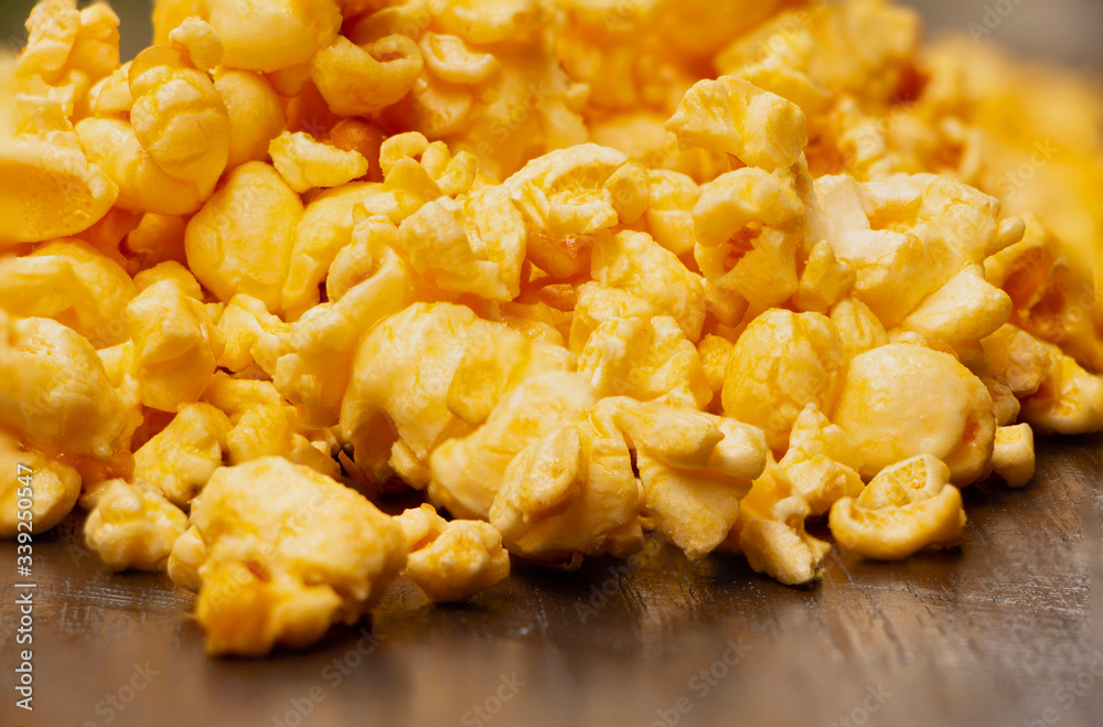 close up yellow popcorn coated with sweet syrup close up yellow popcorn coated with sweet syrup